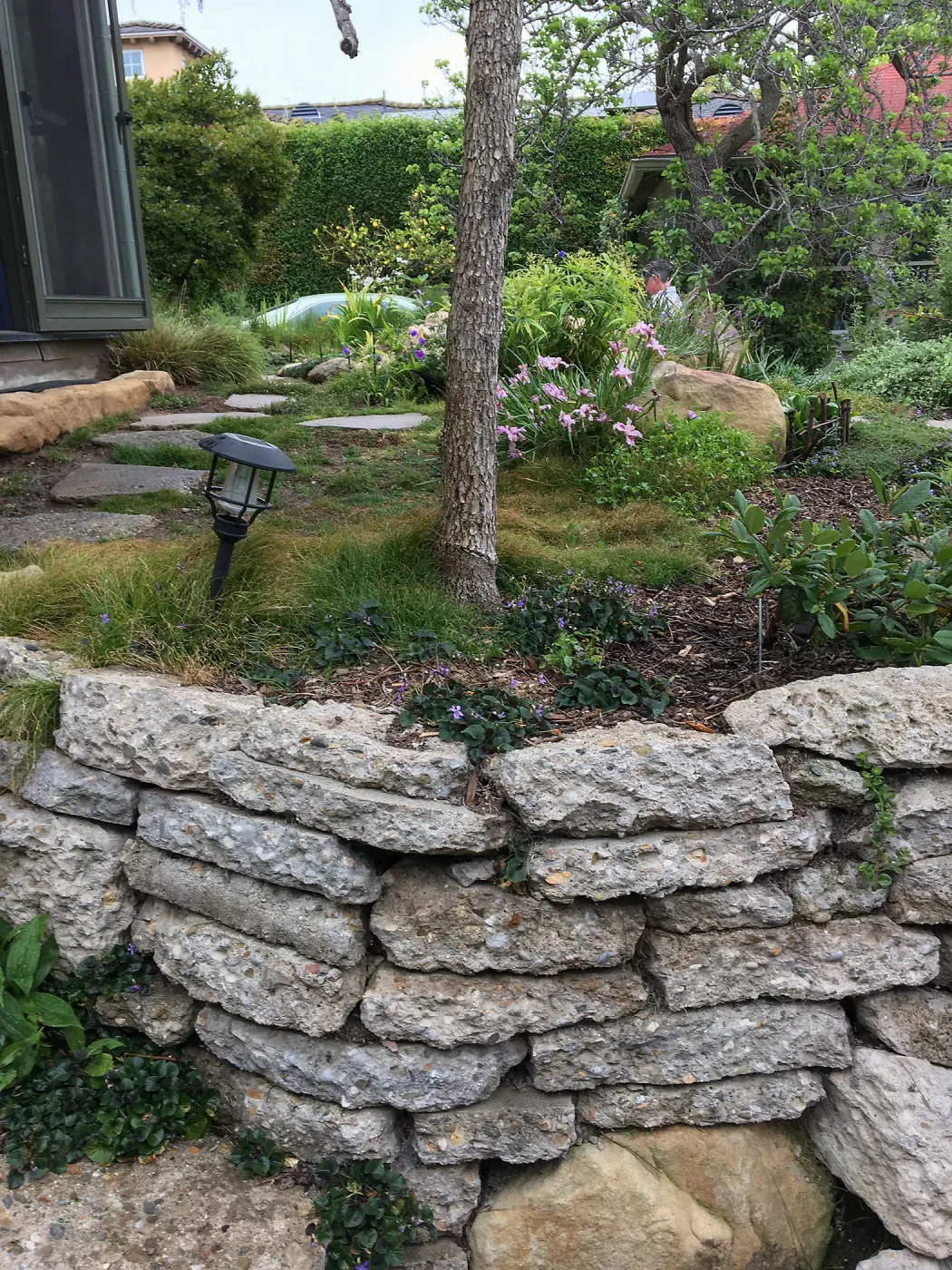 Recycled concrete wall in Isabelle Greeneâ€™s garden