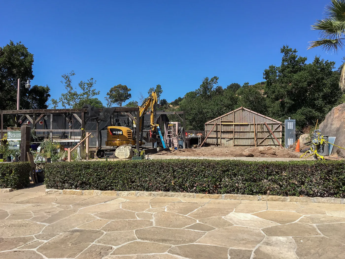 Repair of Garden Growers Lath House, looking west