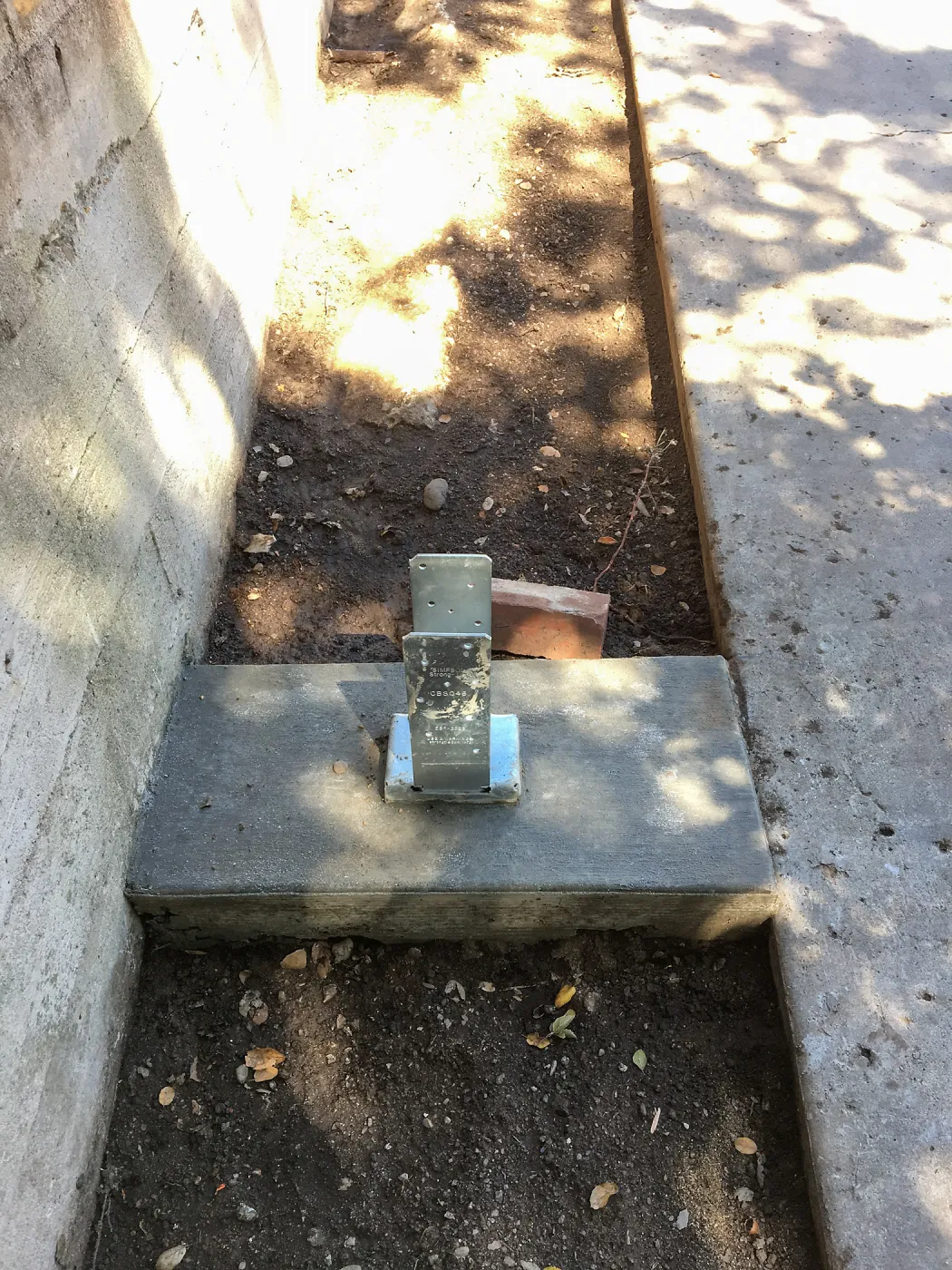 New Patio shade structure tie-downs