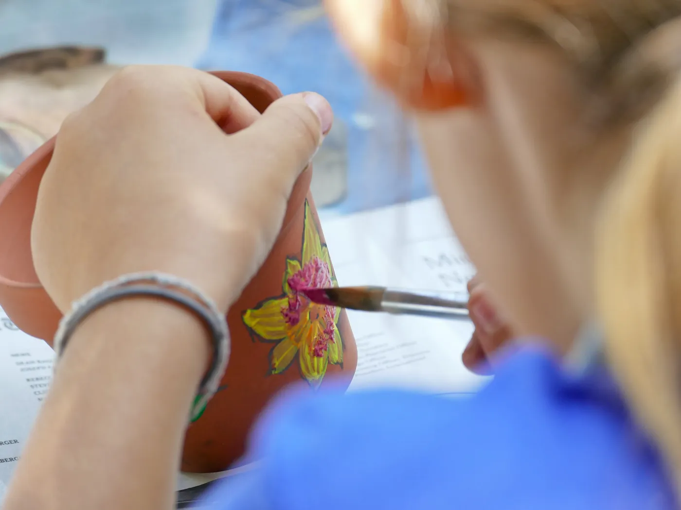 Acorn Adventurers Summer Camp, flower pot decorating activity