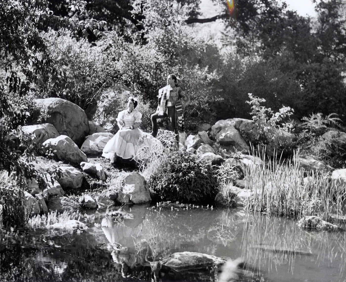 Senor and Senorita beside one of the many pools in the Garden