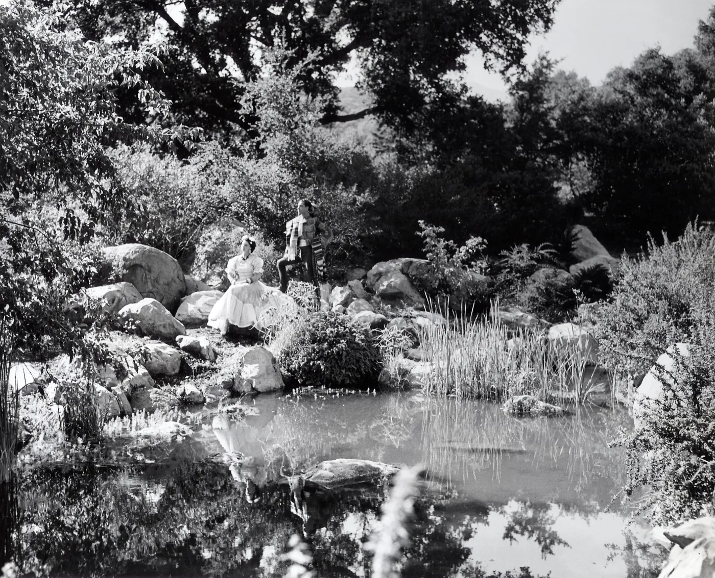 Senor and Senorita beside one of the many pools in the Garden