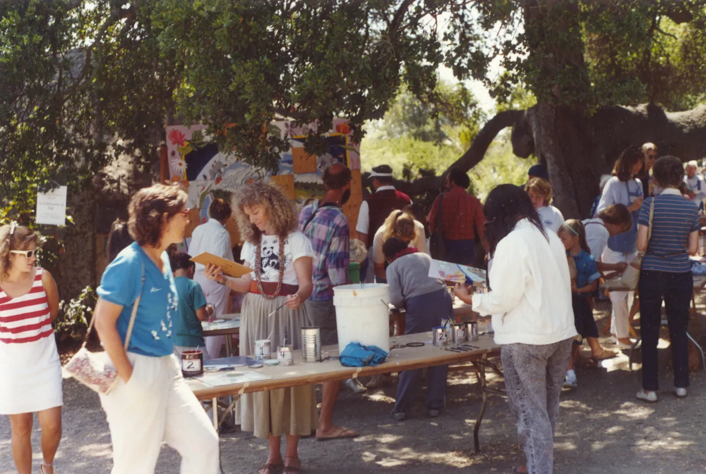 painting the mosaic for the Information Kiosk