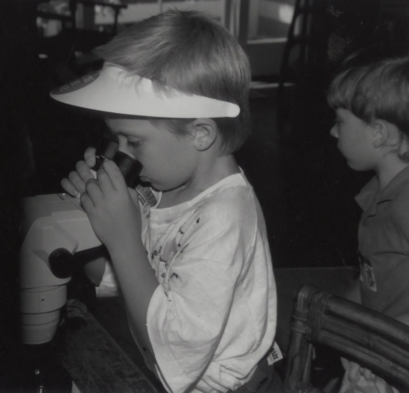 child with microscope