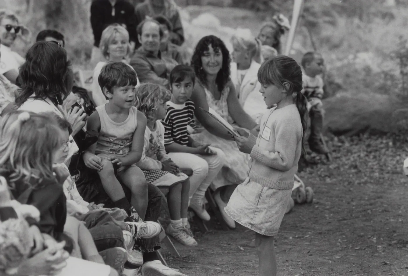 children storytelling in the Garden