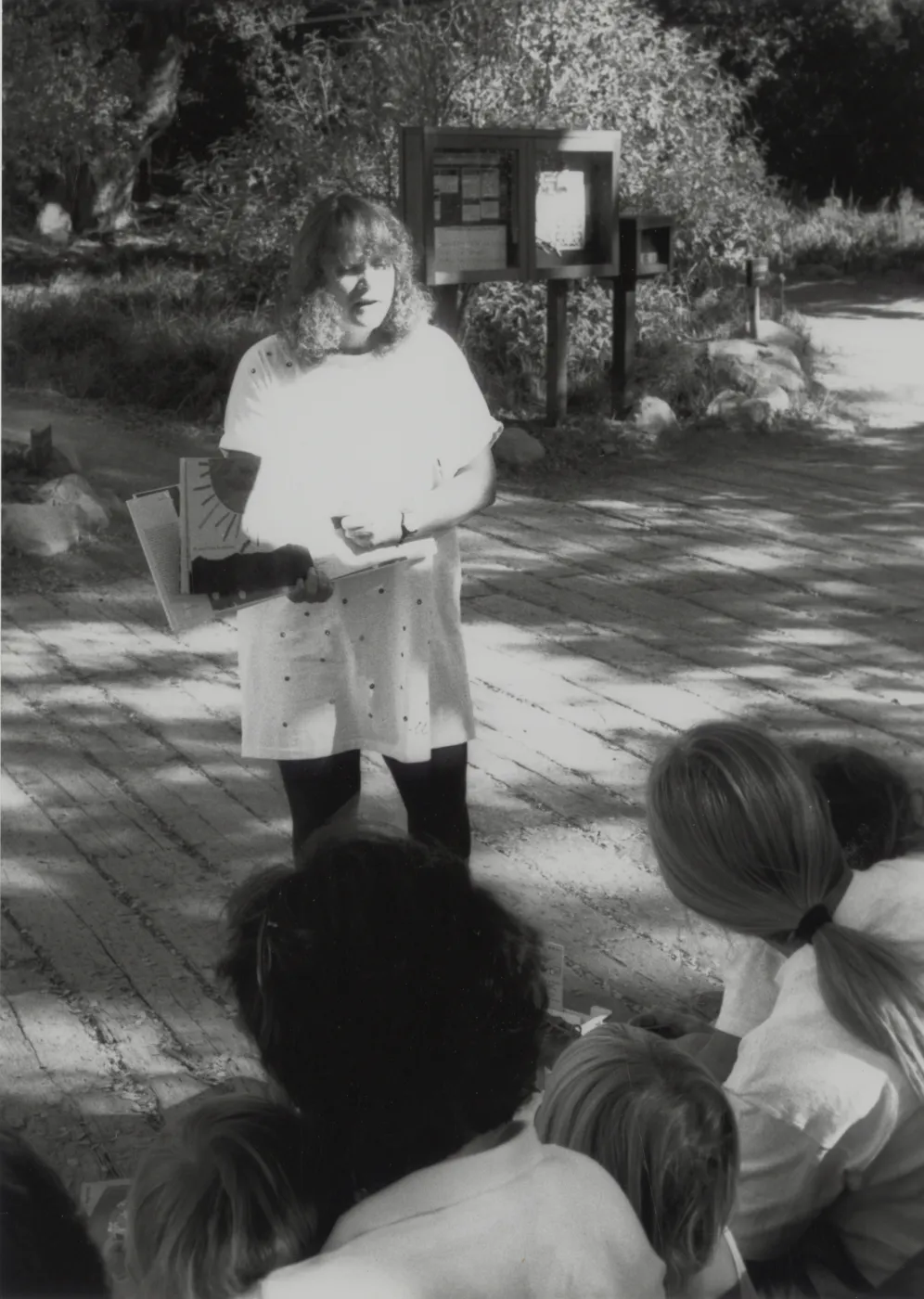 Susie Wilde reads 'Favorite Christmas Stories' aloud at the Botanic Garden