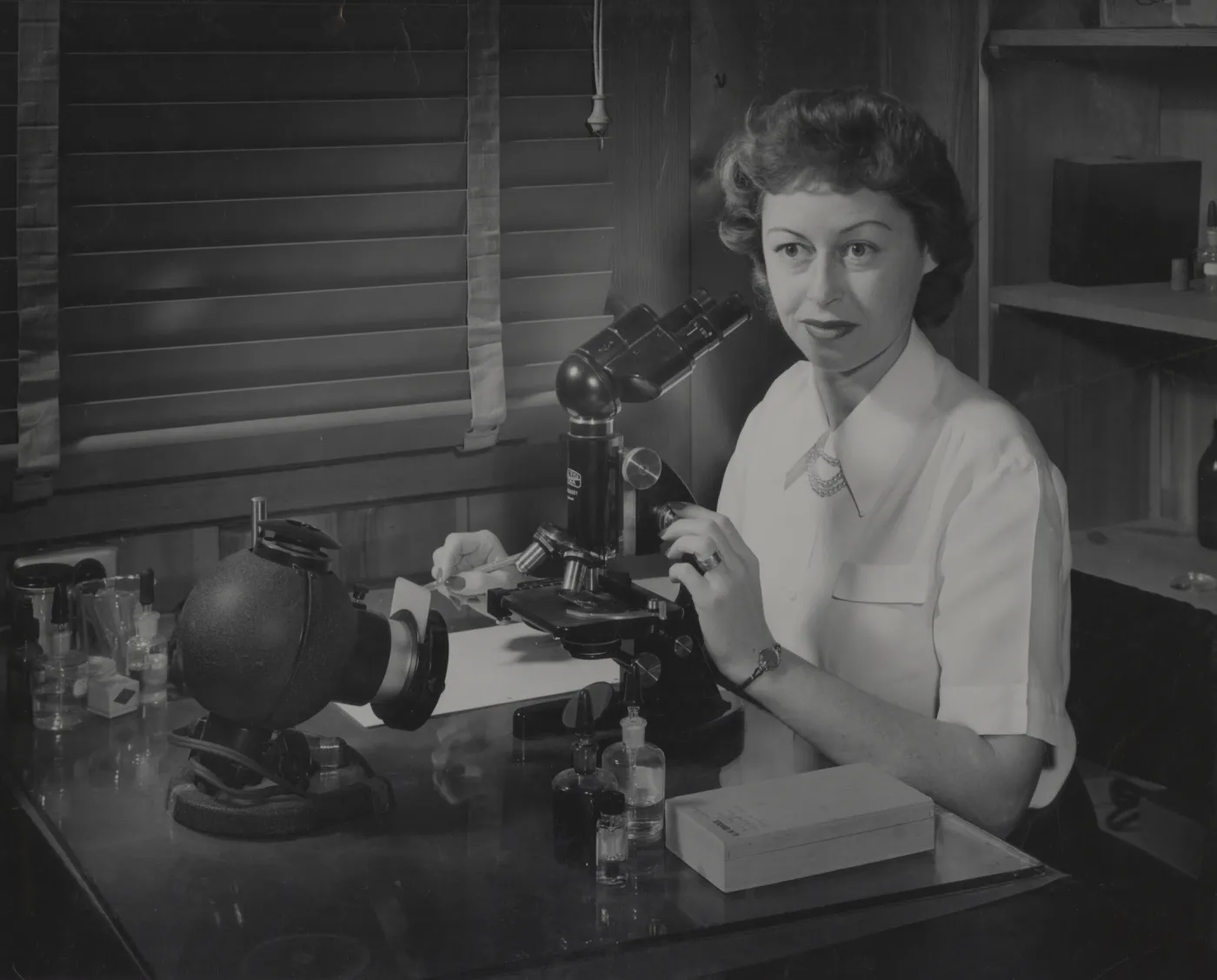 Dr, Marta Walters working on plant genetic studies, 1950