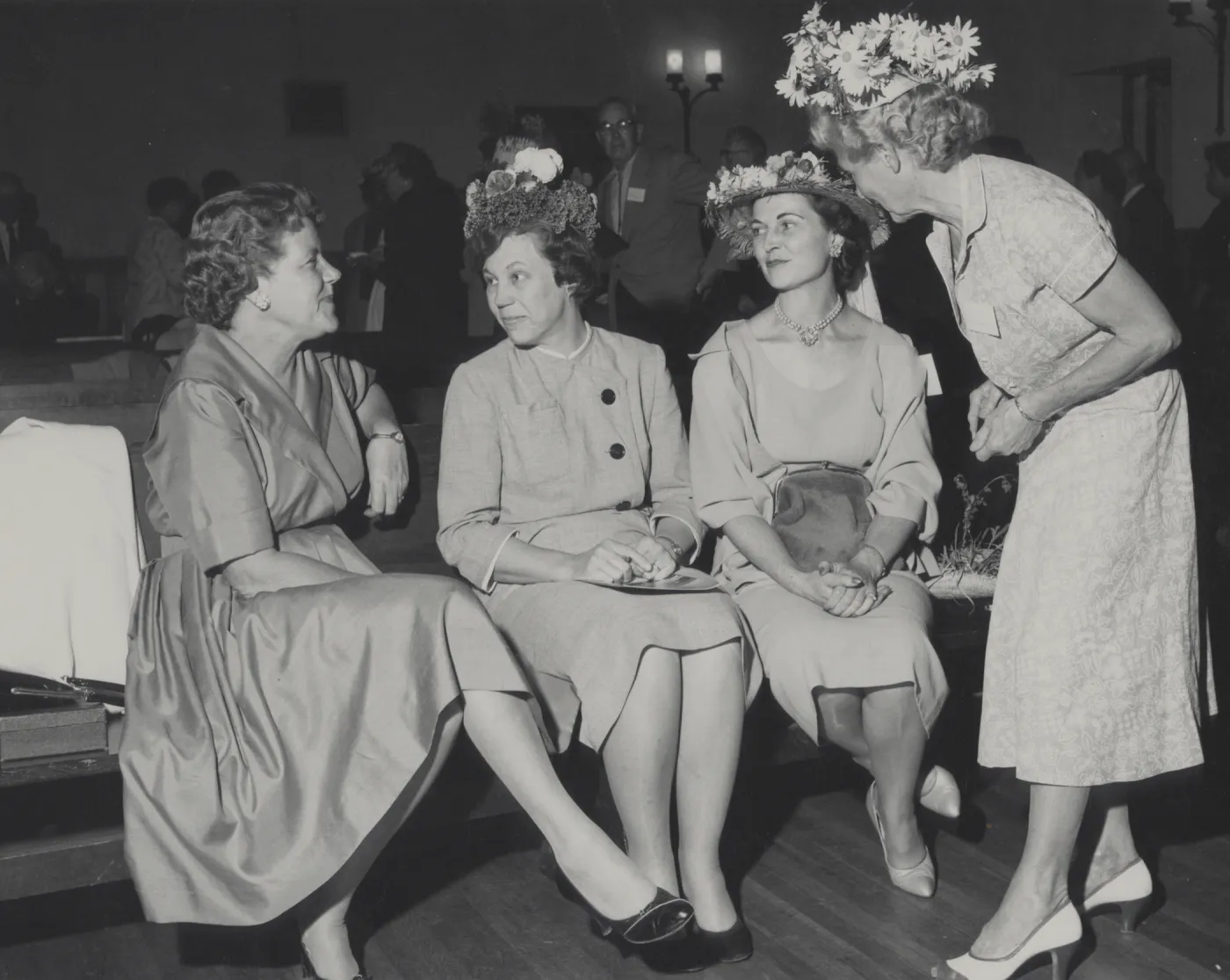 Katherine Muller with three ladies wearing hats