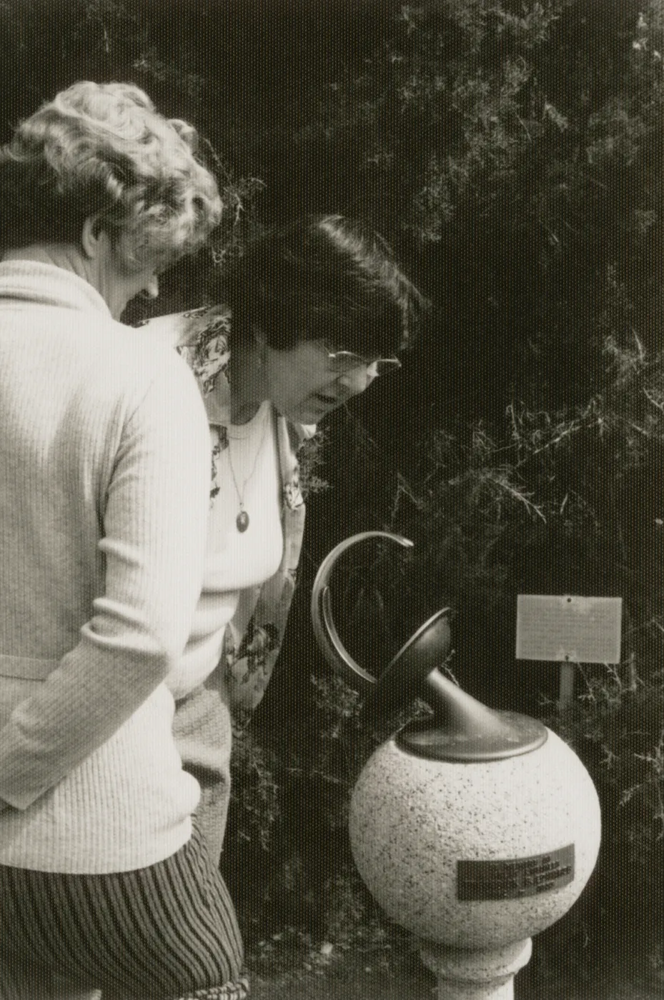 visitors examine the Sundial