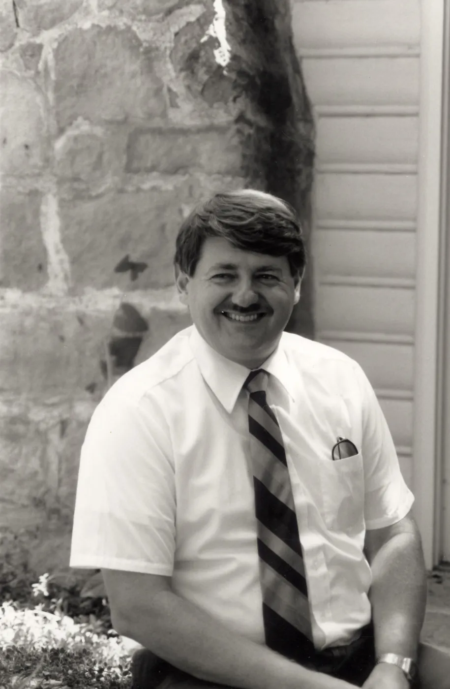 Dr. Edward L. Schneider, in front of Cottage