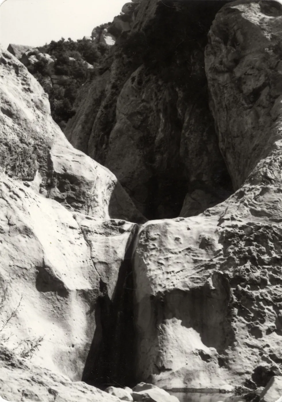 Black and white photograph of rock formation.