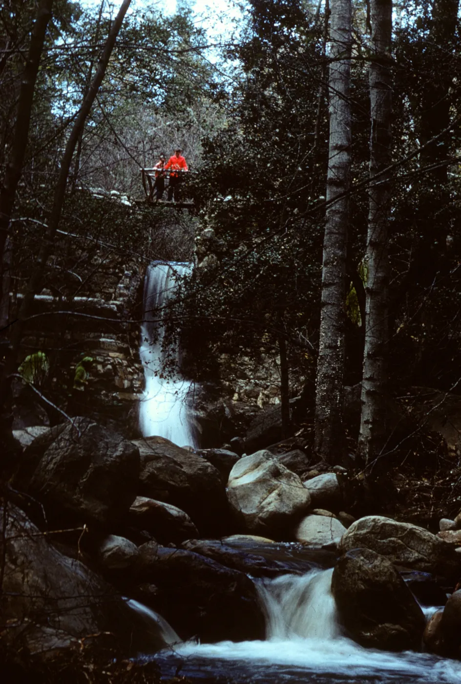standing on the foot bridge above Mission Creek, Mission Dam