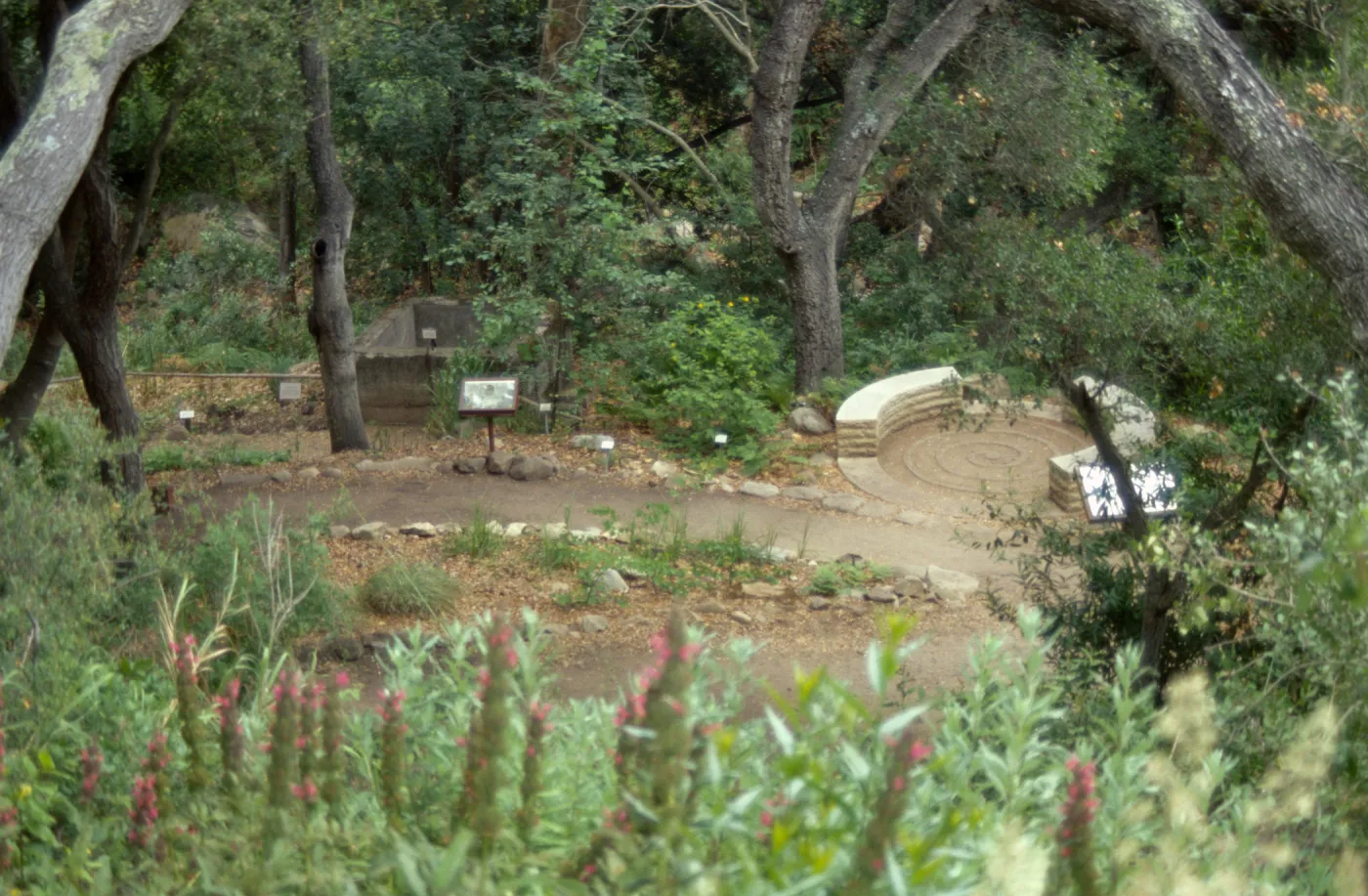 Distance view of Fiber Arts Display and spiral bench