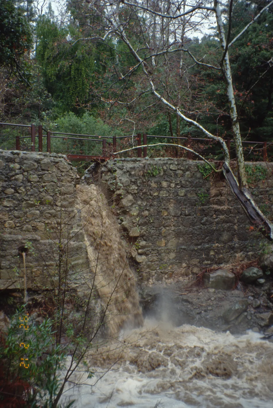 Mission Creek flooding through Mission Dam