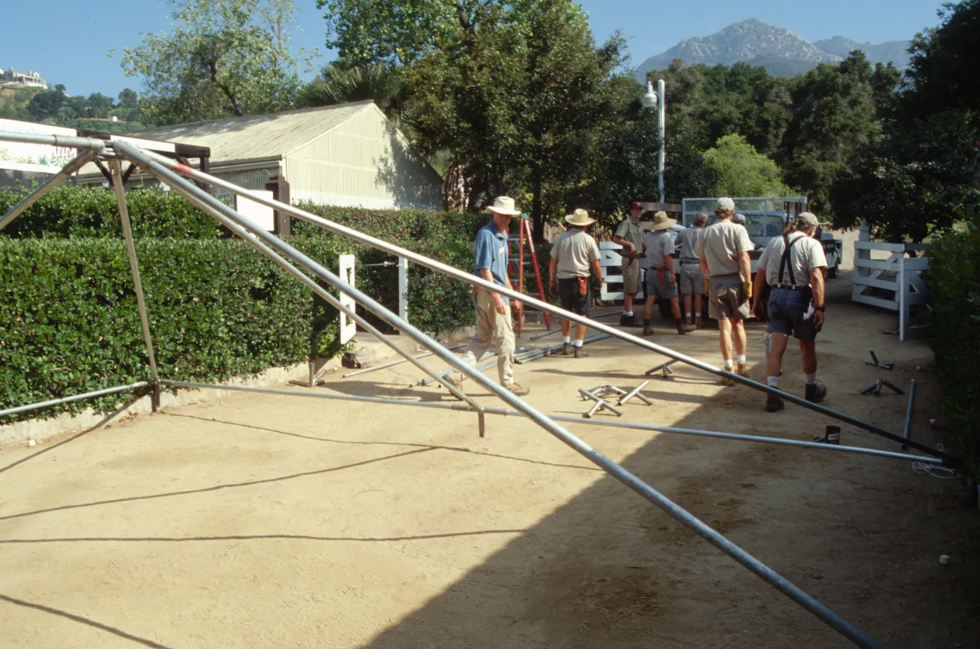 Setting up a canopy in the Courtyard
