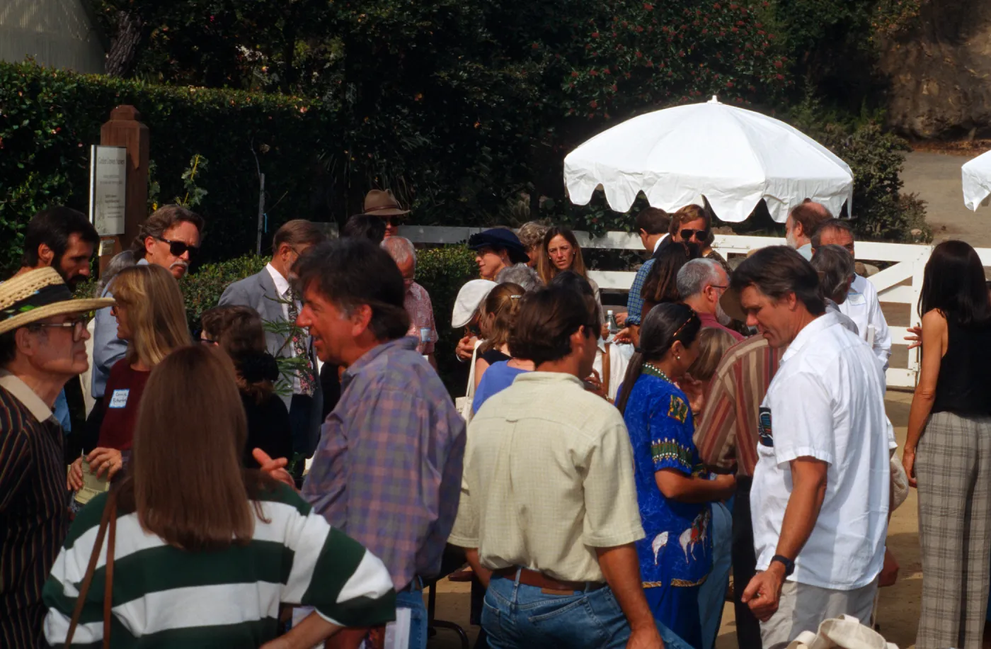 'Flora of Santa Cruz Island' book signing, people gathered in the Courtyard