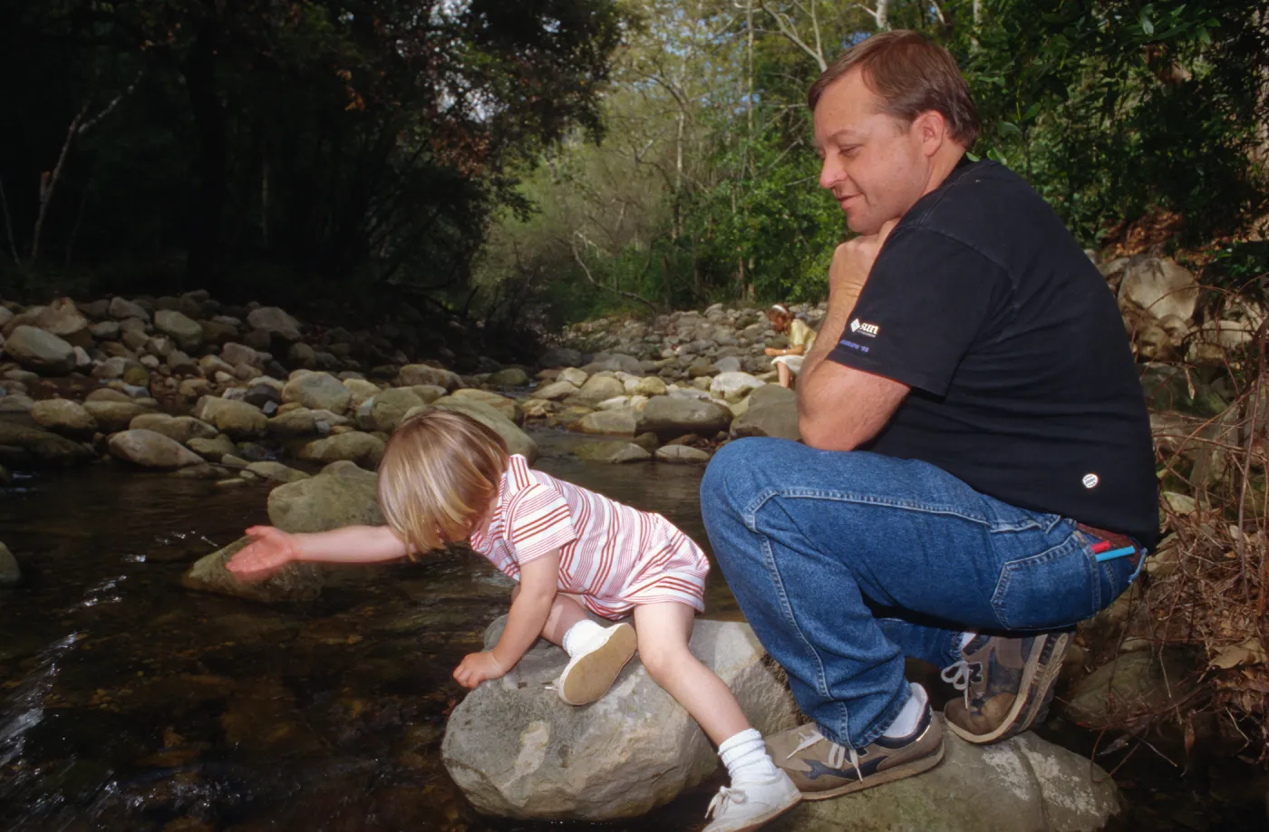 child and father, Mission Creek, Celebration of Trees 1996