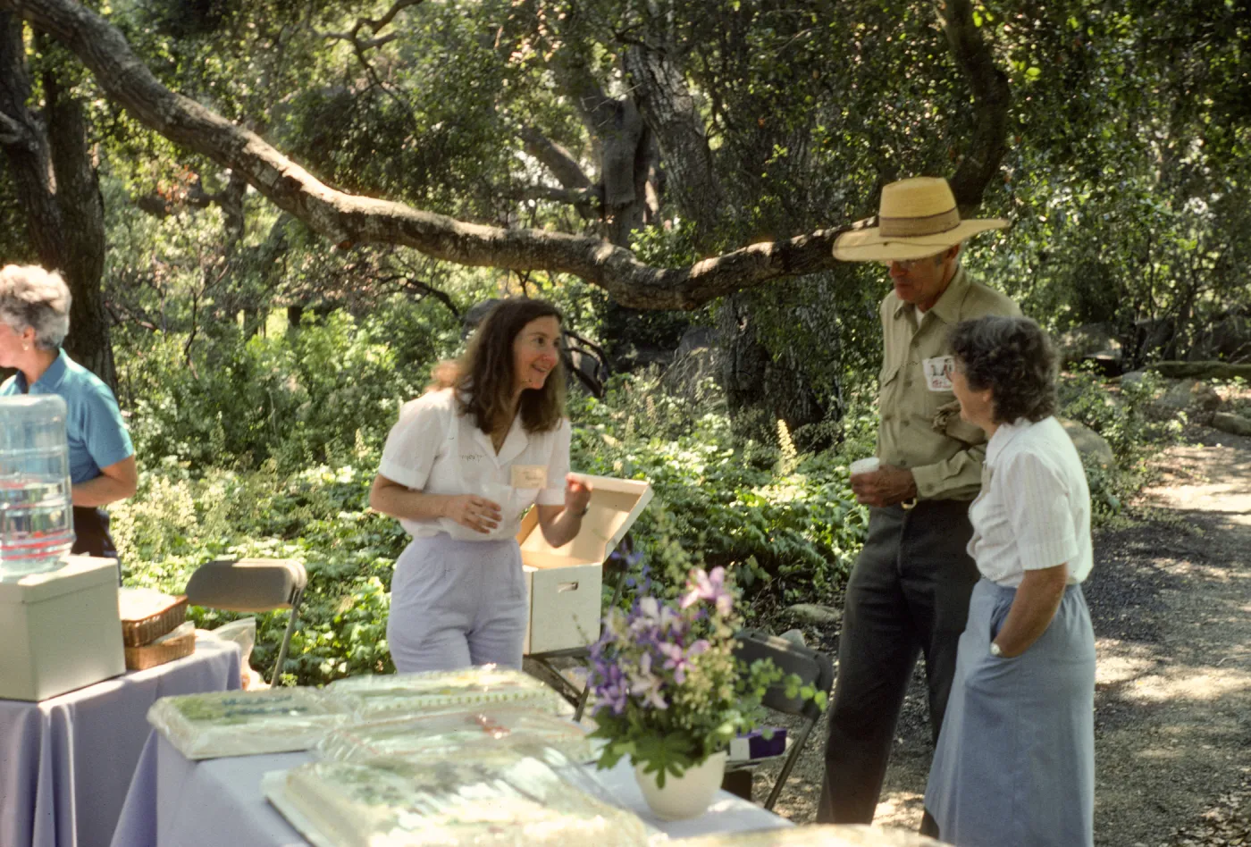 SBBG Members Day Picnic, 1986, the cake table, under the oaks