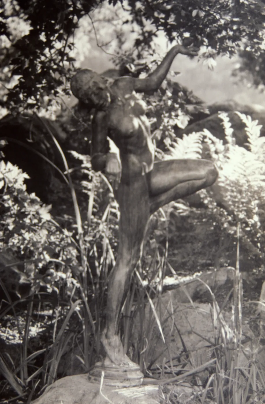 Statue near pond