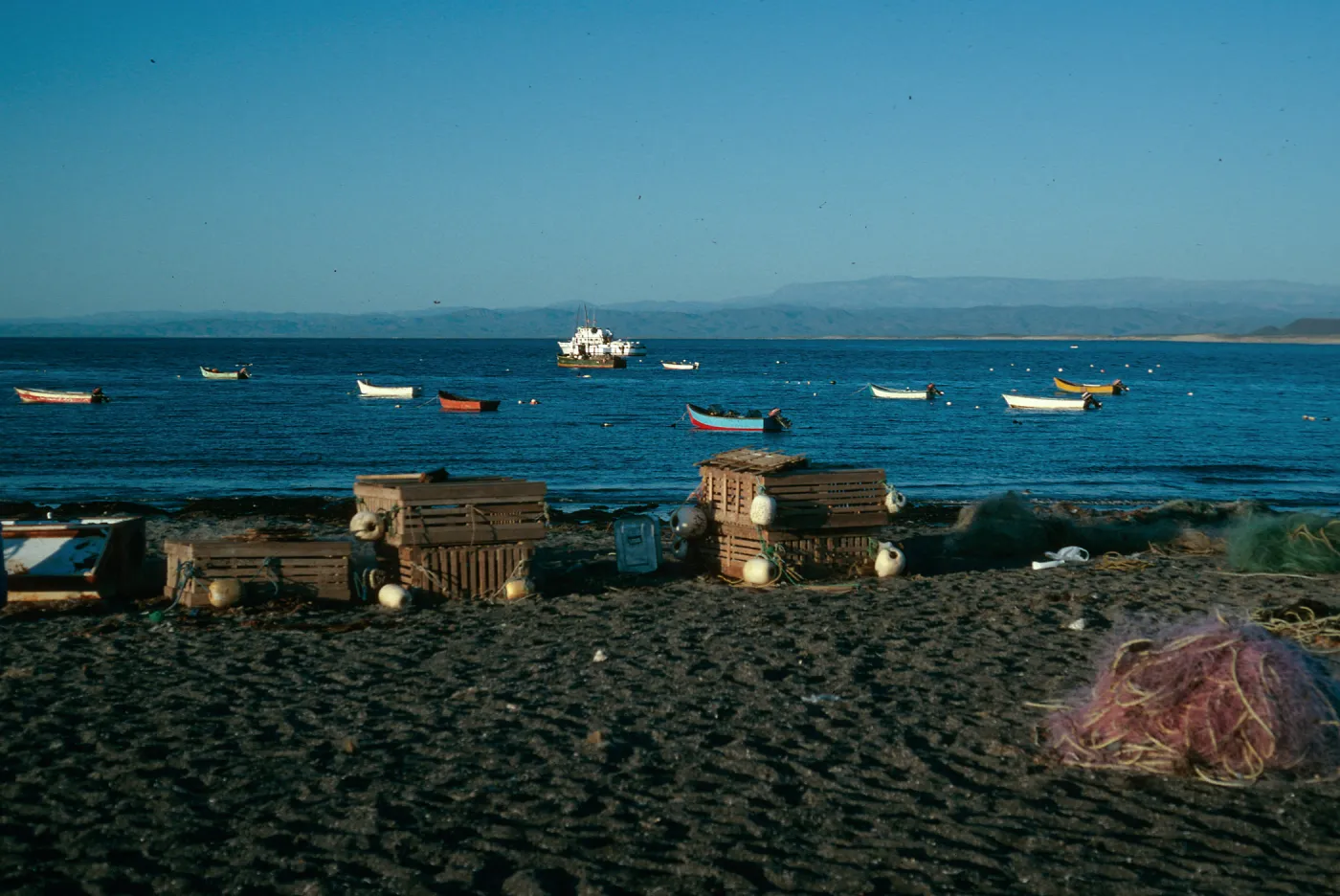 San Martin Island, beach at village, Hasslers Cove