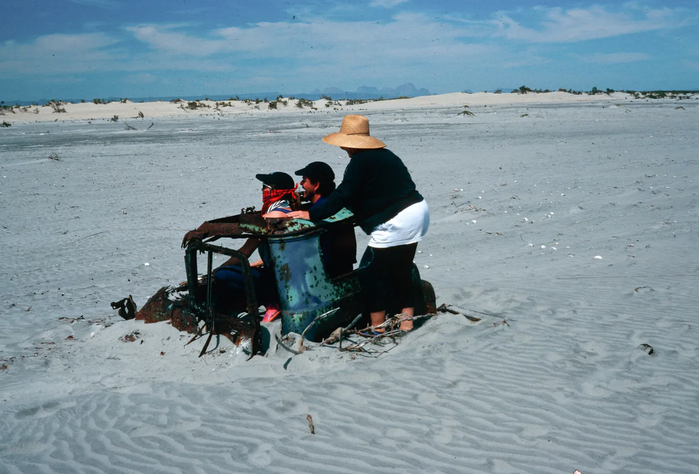 buried car on beach, San Ignacio Lagoon