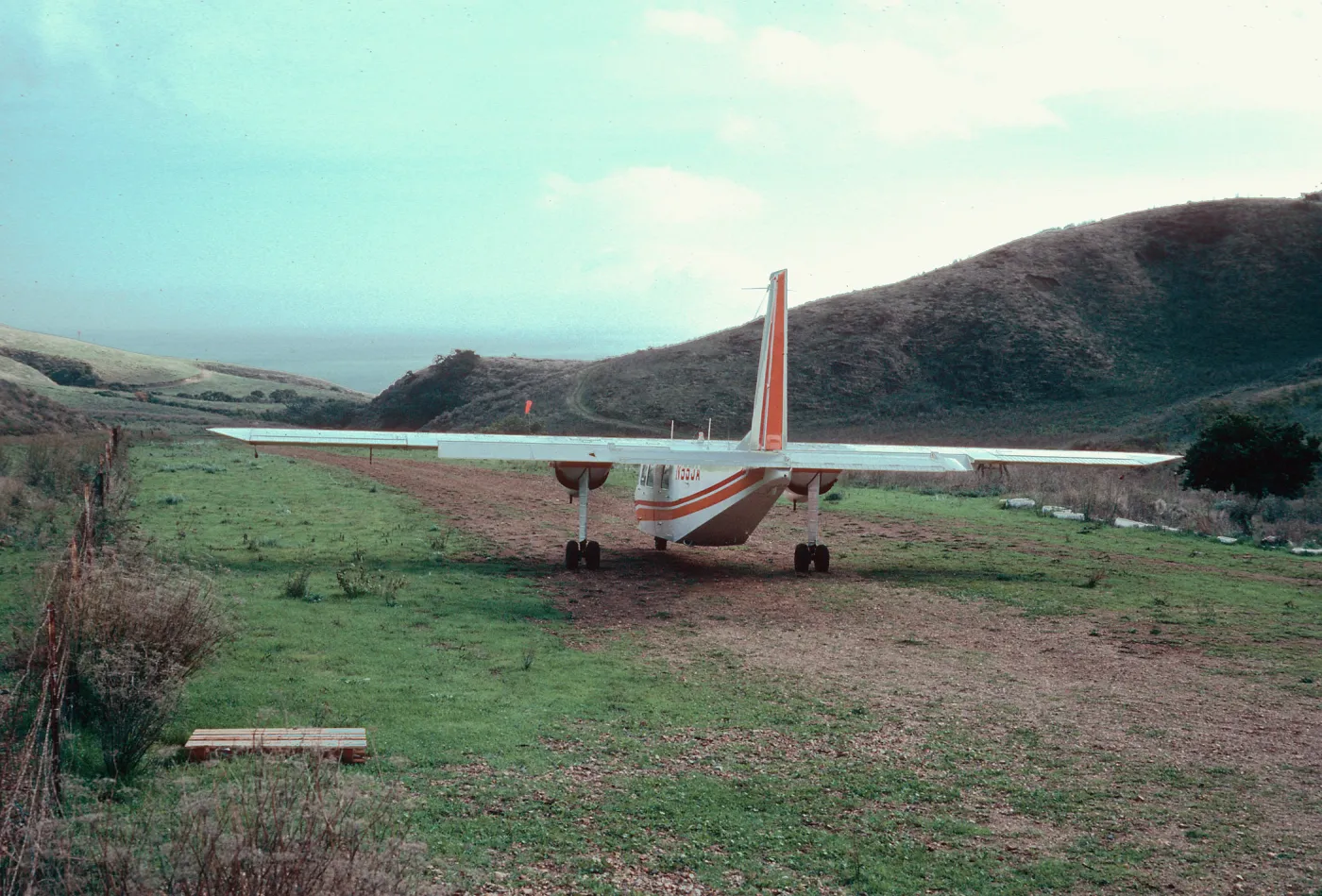 "Islander" taking off on ranch airstrip, Santa Cruz Island