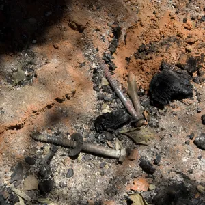 ash and burned ramains of a wooden bench after the Jesusita Fire