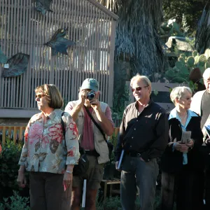 people in line for Carol Bornstein book signing, Geege Ostroff (camera) and Dave Kershaw