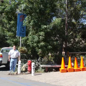 Specialty Tool delivers orange safety cones to mark areas in the Garden closed due to fire damage, after the Jesusita Fire