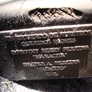 burned wood bench and dedication plaque, after the Jesusita Fire
