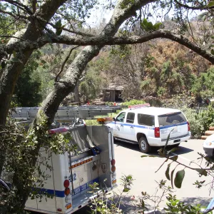 Parking lot with Santa Barbara County fire vehicles at the Santa Barbara Botanic Garden, after the Jesusita Fire