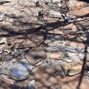 burned debris and broken decorative clay tiles, at the Gane/Lotterhos site, after the Jesusita Fire