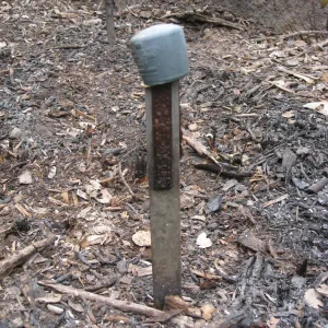 accession stake, damaged signs and public information labels after the Jesusita Fire