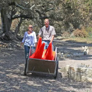 Tricia Wardlaw and Bob Muller distributing safety cones at trails closed by the Jesusita Fire