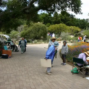 SBBG Entrance, artist painting in the Garden