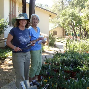 Betsy Collins and Corinne Gallagher prepare for the Spring Plant Sale, 2011