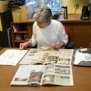 Ky Easton, SBBG Hernarium volunteer, mounting herbarium specimens, 2011