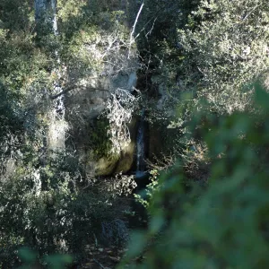 view from canyon rim down to Mission Dam and aqueduct
