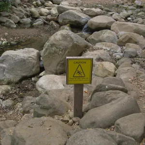 Lower creek crossing caution sign