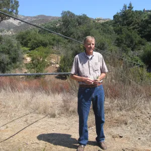 Bob Muller with sagging power lines at Tunnel Road gate