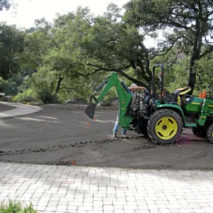Dave Kershaw digging holes for new oak trees in the Meadow Oaks