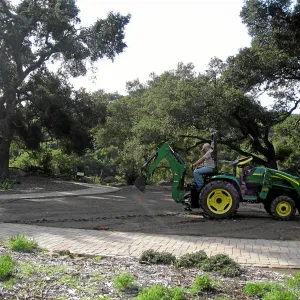 Dave Kershaw digging holes for new oak trees in the Meadow Oaks