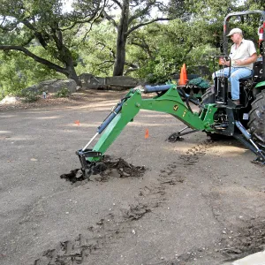 Dave Kershaw digging holes for new oak trees in the Meadow Oaks