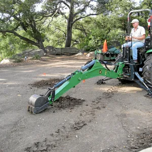 Dave Kershaw digging holes for new oak trees in the Meadow Oaks