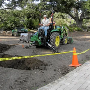 Dave Kershaw digging holes for new oak trees in the Meadow Oaks
