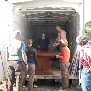 The Library table, SBBG Staff cleaning out temoporary storage container, after the Jesusita Fire