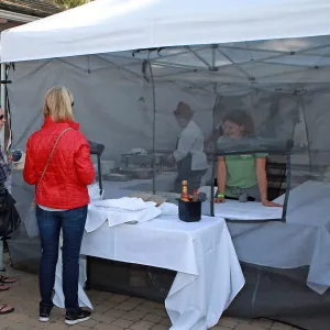 Santa Barbara Beer Garden Event, Nina dunbar lending a hand in the food tent
