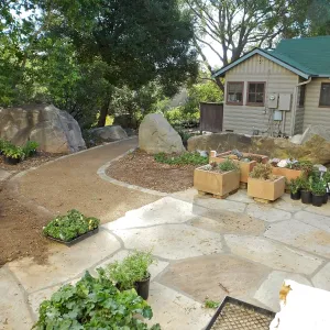 Home Demonstration Garden Renovation, view 3, north side of Cottage, first day of replanting work