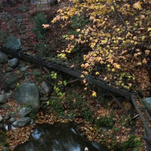 Mission Aqueduct and pool below Mission Dam after rain