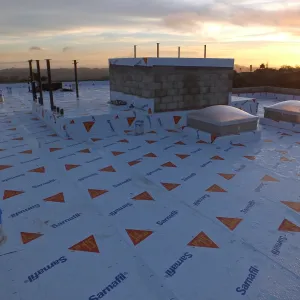 Pritzlaff Conservation Center Construction, looking southwest across roof, temporary waterproofing
